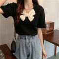 Women’s Short Sleeve Sweater with Pearl and Bow Detail